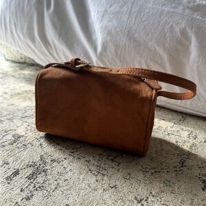 The 90s Bag in the Row style camel suede
